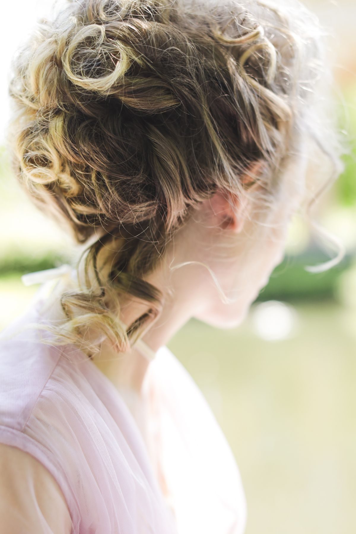 Elegante geflochtene Hochsteckfrisur
